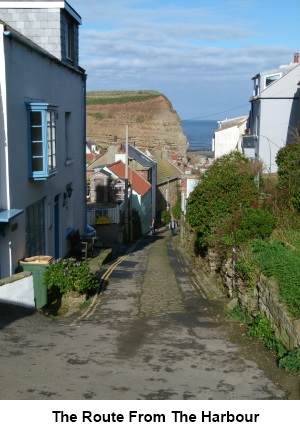 The steep street leading from Staithes harbour.