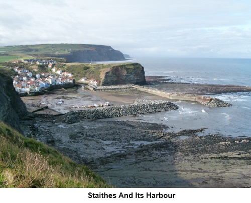 The village of Staithes showing its harbour.