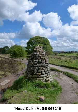 The 'neat' cairn at the junction of paths at OS reference SE 066219