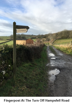 Fingerpost at the turn off from Hampsfell Road.