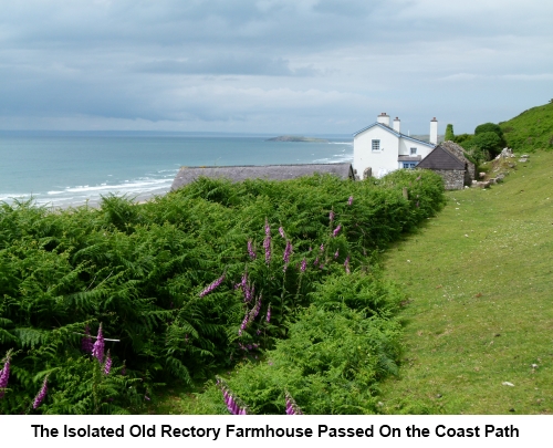 The isolated Old Rectory Farmhouse by the coast path.