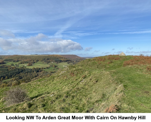 The view north west to Arden Great Moor showing the stone cairn on Hawnby Hill.