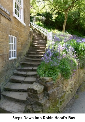 Steps down into Robin Hood's Bay.