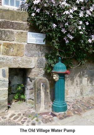 An old Victorian waterpump in Robin Hood's Bay.