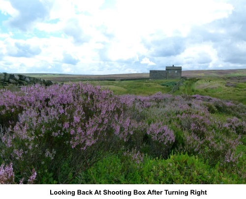 Looking back to the shooting lodge after turning right