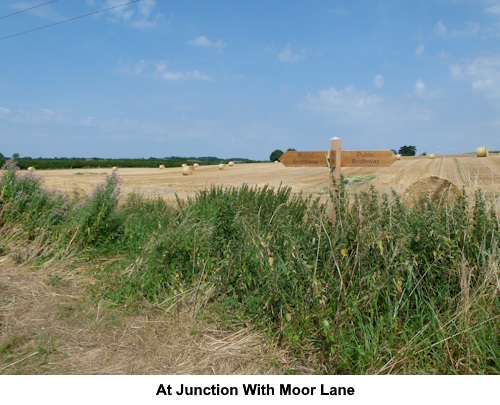 At the junction with Moor Lane.