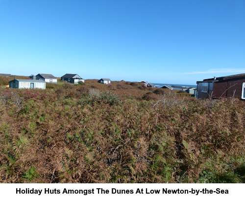 Holiday huts amongst the dunes at Low Newton-by-the-sea.