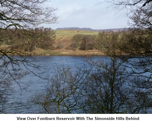 Fontburn reservoir with the Simonside Hills to the rear.