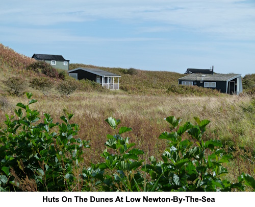 Holiday huts on the dunes at Low Newton-by-the-Sea.