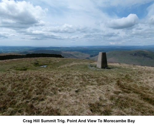 Trig point at Crag Hill summit and view to Morecambe Bay