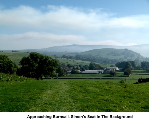 Approaching Burnsall with Simon's Seat in the background