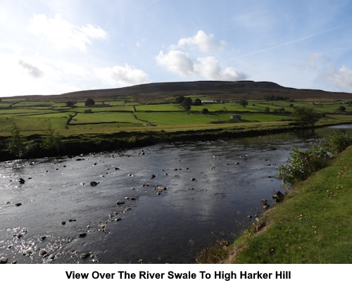 A view over the River Swale to High Harker Hill.